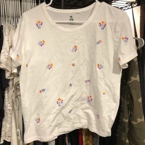 White shirt with flower motif